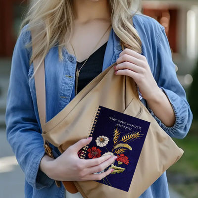 دفتر ملاحظات بغلاف مقوى حلزوني بتصميم منقوش لأداء الأعمال